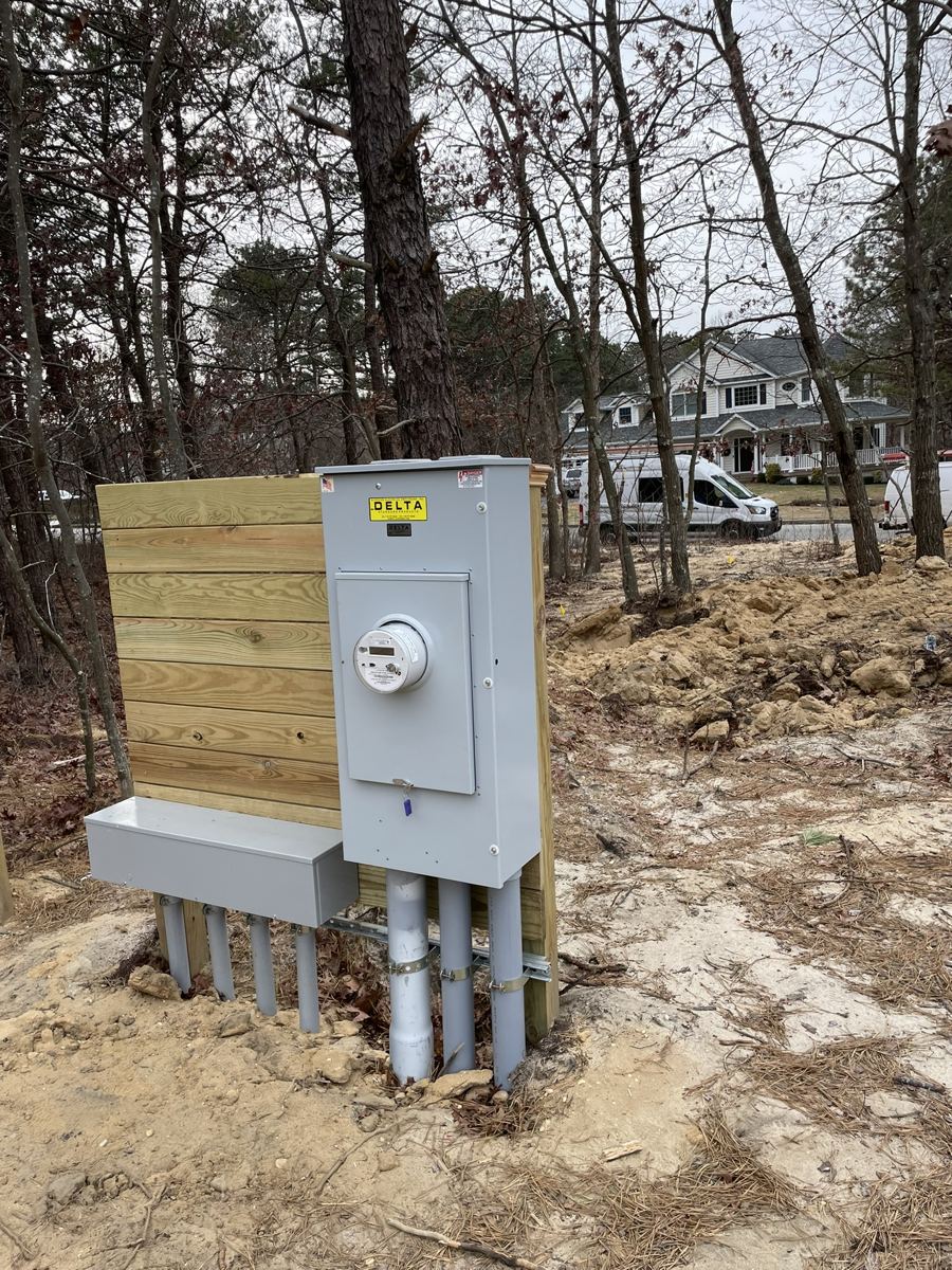 Temporary electrical service and meter on a new-construction lot